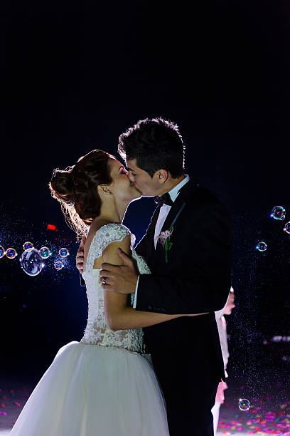 istock grooms kissing 472156557