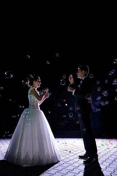 istock grooms with water balloons 472156601