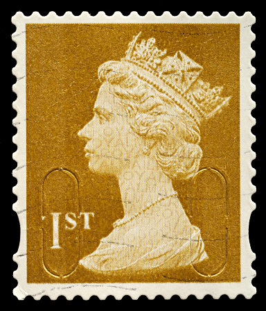 Exeter, United Kingdom - November 21, 2010: An English Used First Class Postage Stamp showing Portrait of Queen Elizabeth 2nd, printed and issued in 2010