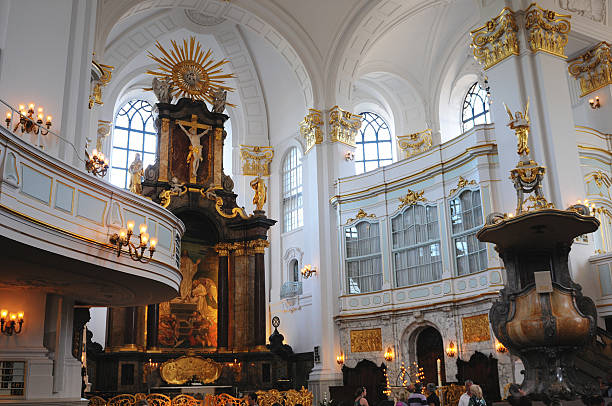 Hamburg, Germany - June 3, 2011: People visiting altar of St. Michael's Church, Hamburg (Germany). its a  well known baroque church in Hamburg.