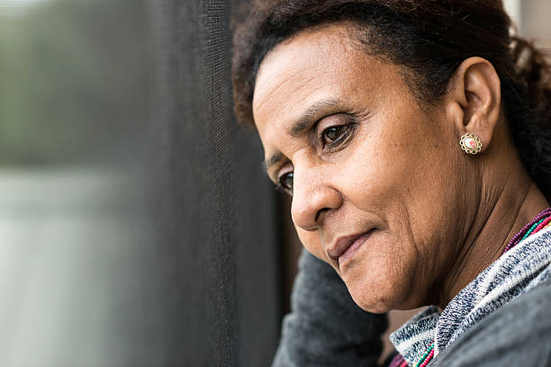 istock Pensive Mature woman 472157417