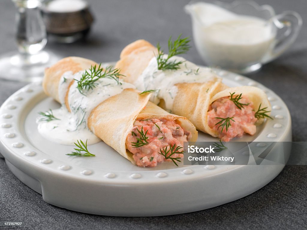 Stuffed pancake Stuffed pancake with salmon and sauce, selective focus Salmon - Seafood Stock Photo