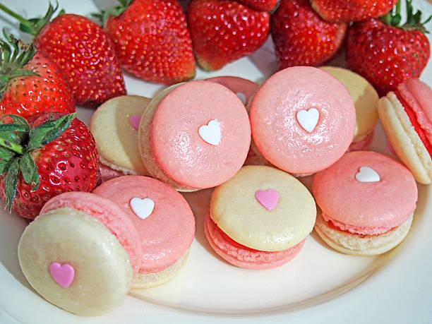 istock Strawberry french macarons with heart 472158445
