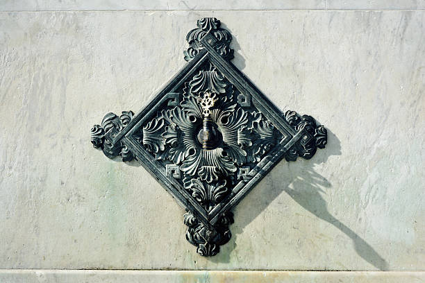 istock Old iron and marble fountain 472159598