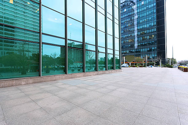 istock Empty road near modern building exterior 472159912
