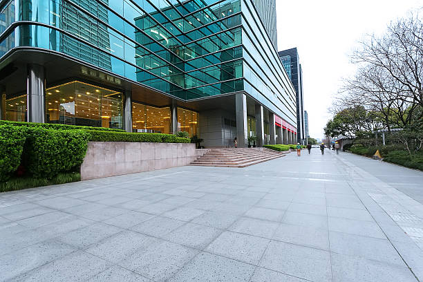 istock Empty road near modern building exterior 472159918