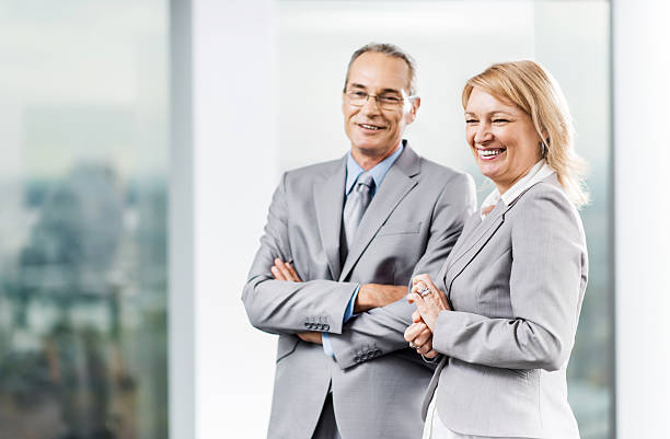 istock Cheerful business people. 472160463