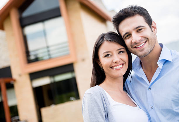 istock Couple in their new house 472160601
