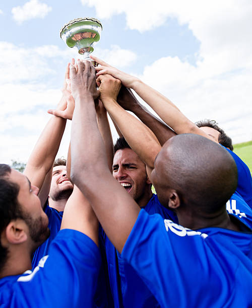 istock Football team celebrating a victory 472160691