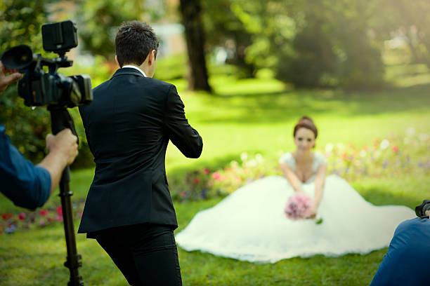 istock groom photographing his bride 472161523