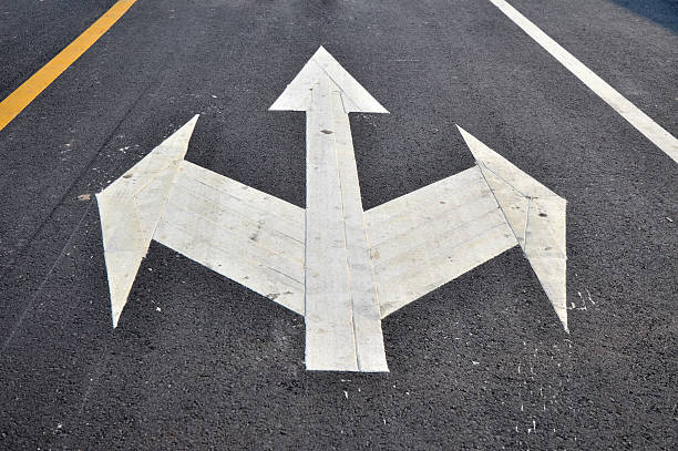 istock Aspalt road with diversion arrow 472161733