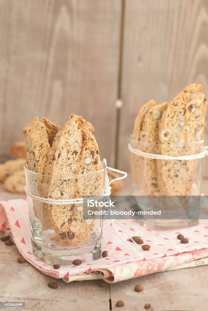 Hazelnut coffee biscotti Hazelnut coffee biscotti in a glass on wooden background Biscotti Stock Photo
