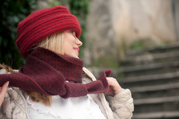 istock Beautiful Woman with Red Woolen Cap and Scarf 472162221