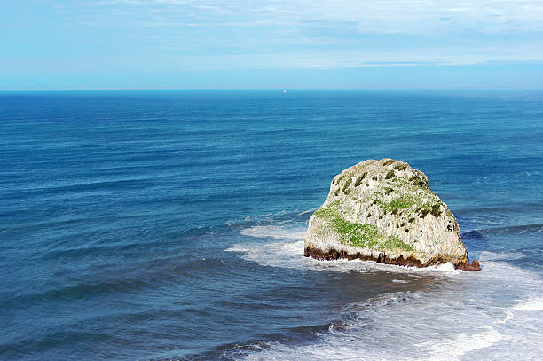 istock small rocky island named Aketxe in Bermeo 472164319