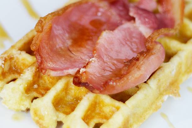 waffle, bacon & maple syrup stock photo