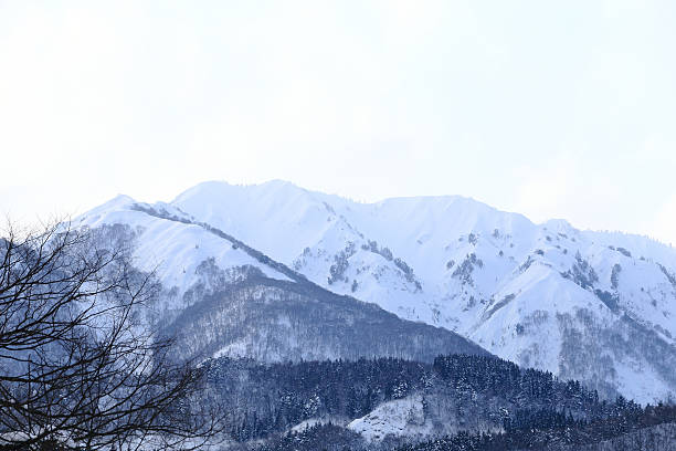 istock snow covered mountain in Takayama japan 472165711