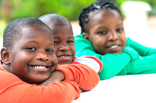 Smiling afro caribbean cute children