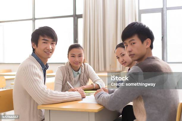 Group Of College Students Learning In The Classroom Stock Photo - Download Image Now