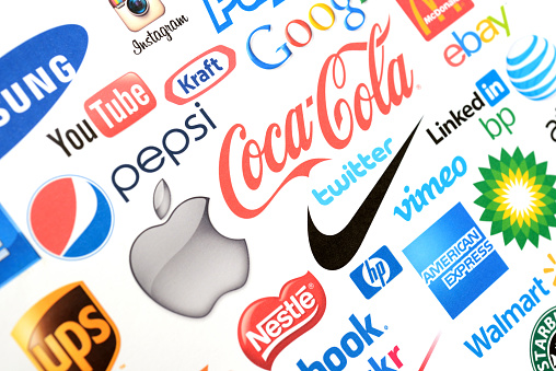 İstanbul, Turkey - February 8, 2014:  Well-known world brands logos on white paper, including Apple, Coca-Cola, Mc Donalds, Nike, ebay, Twitter, ups, Youtube, Vimeo.