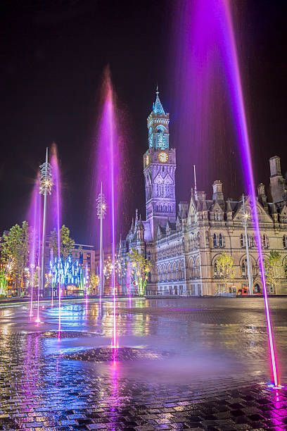 istock Bradford City Hall at night, reflected in the mirror pool in Centenary Square. 472167163