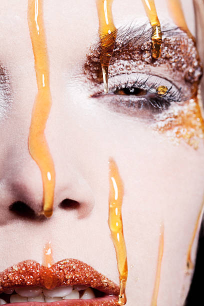 istock Female Beauty Honey Sugar Make-up Close-Up Creative 472167797