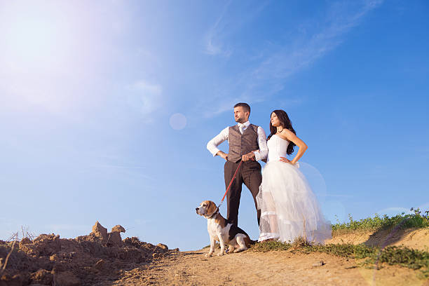 istock Bride and groom with dog 472167923