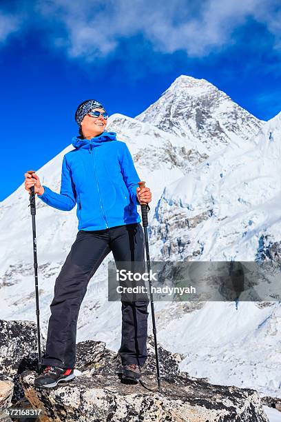 Woman Trekking In Himalayas Mount Everest On The Background Nepal Stock Photo - Download Image Now