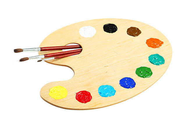 istock Wooden art palette with paints isolated on white 472168330