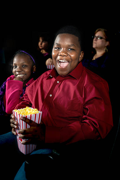 istock Kid at the movies 472168677