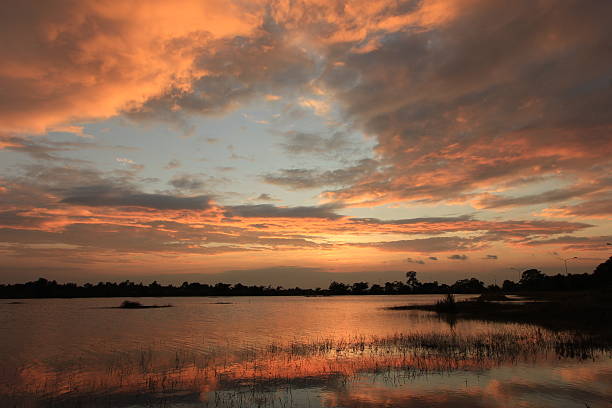 заход солнца - moody sky outdoors digital composite sunset стоковые фото и изображения