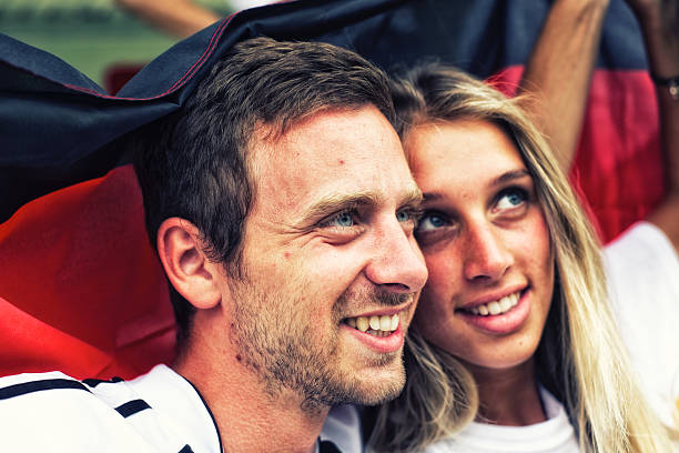 istock Sports fans cheering a game 472169821