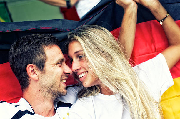 istock Sports fans cheering a game 472169845