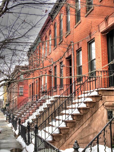 istock Red Brick Brownstone Buildings from an angle 472171048