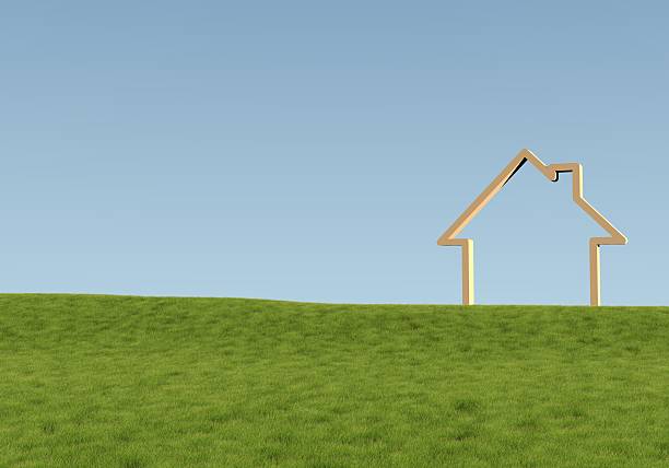 House icon in green field