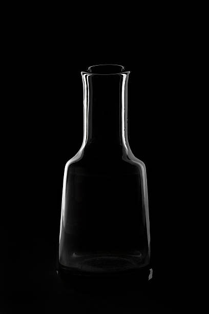 istock silhouette of the bottle on a black background 472171333