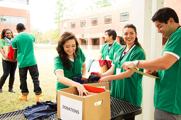 istock Volunteers: College students collect clothing donations for needy. 472171577
