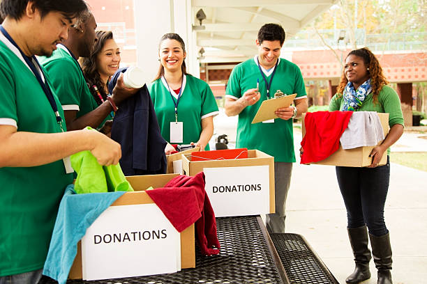 istock Volunteers: College students collect clothing donations for needy. 472171847