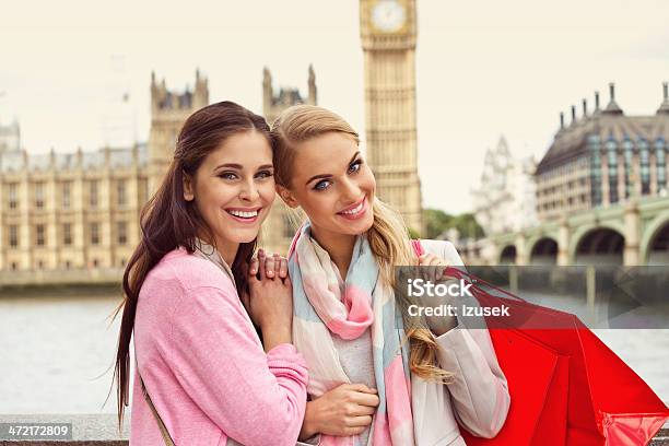 Two Smiling Women At Westminster Bridge London Stock Photo - Download Image Now - Big Ben, Friendship, Beautiful Woman
