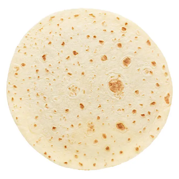 Piadina, round italian tortilla isolated on white, clipping path included