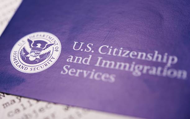 US Homeland Security US Homeland Security Citizen and Immigration Services Flyer Closeup. department of homeland security stock pictures, royalty-free photos & images