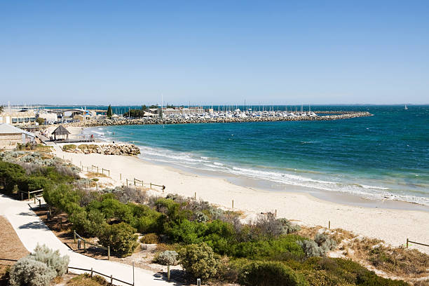Bathers beach in Fremantle, Perth, Western Australia. A harbour is visible in the distance.