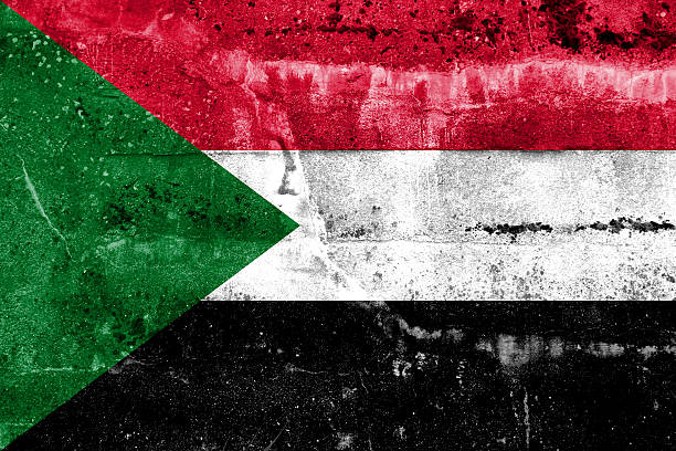 istock Sudan Flag painted on grunge wall 472174787