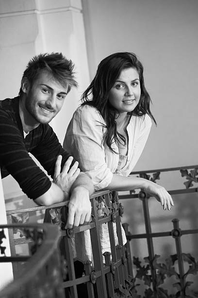 Young Couple of Students at the Balcony - 20s student stock photo