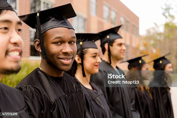 Education African Descent Male Graduate And Friends On College Campus Stock Photo - Download Image Now
