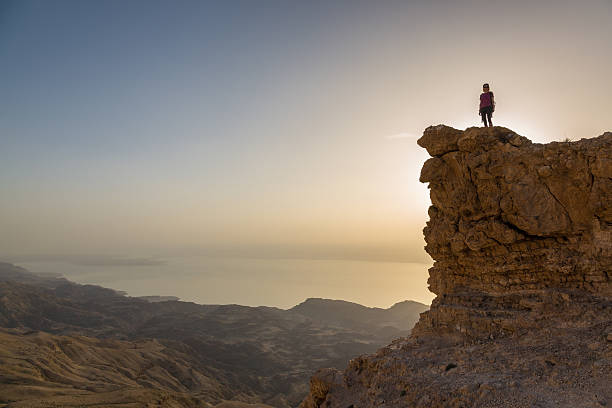 istock Dead Sea Sunset Girl 472176703