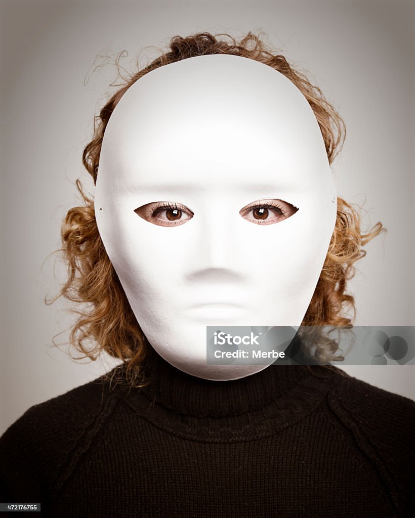 No identity Person with a white mask Costume Stock Photo
