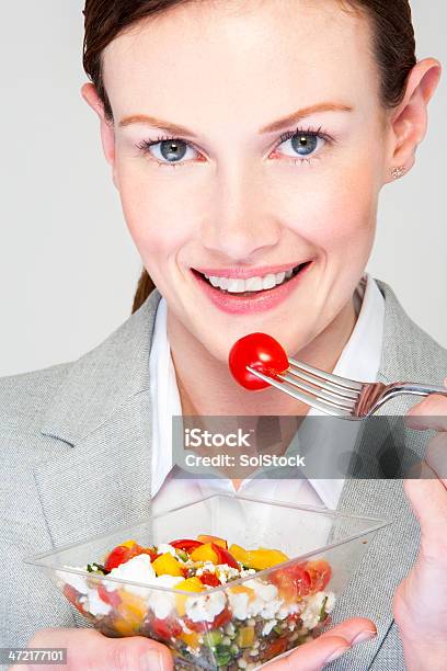 Businesswoman Eating A Salad Pot Stock Photo - Download Image Now - 30-39 Years, Adult, Adults Only