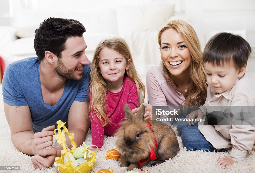 Cheerful family with bunny for easter Family Stock Photo