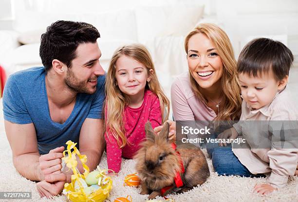 Cheerful Family With Bunny For Easter Stock Photo - Download Image Now - Family, Easter Bunny, Rabbit - Animal