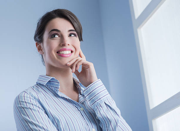istock Attractive woman smiling 472179155